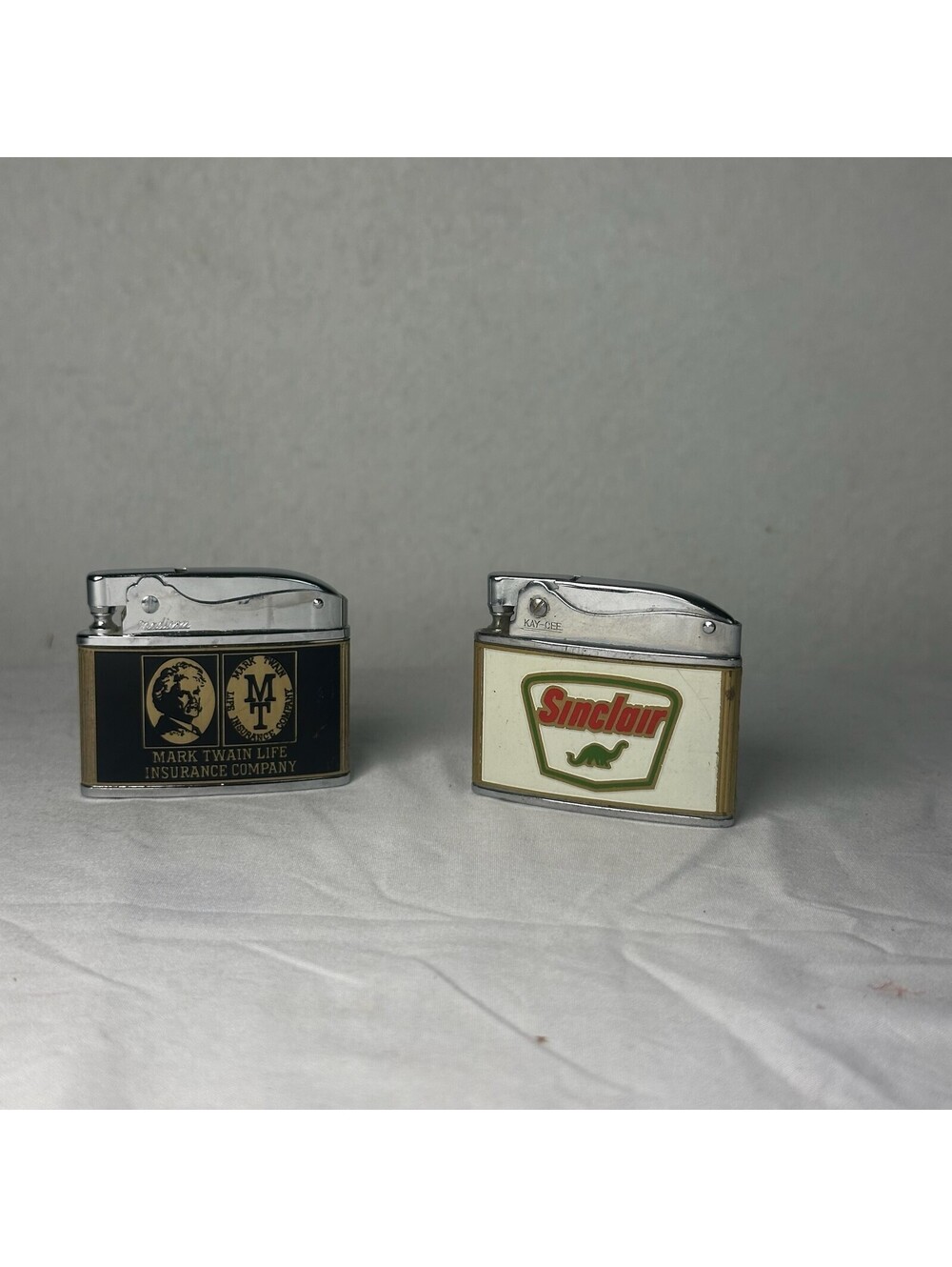 Lot of 2 Vintage Kay-Cee Advertising Lighters Mark Twain Sinclair S-2